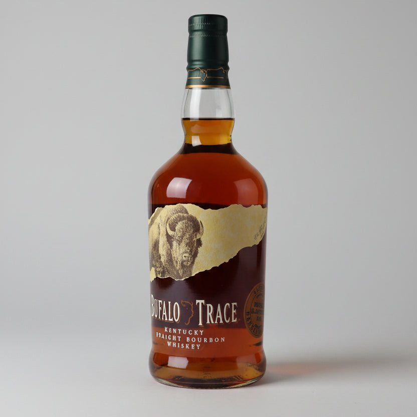 Bottle of Buffalo Trace bourbon whiskey on a bar counter with a blurred background