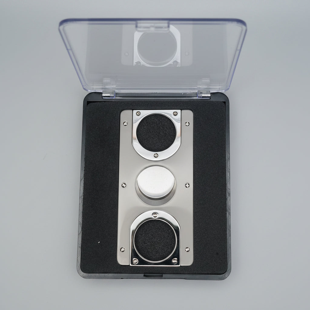 Close up of boxed two tone cigar cutter