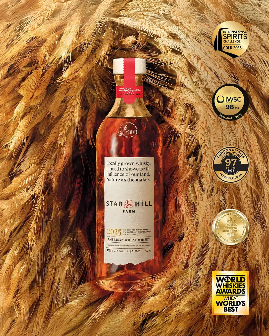 Star Hill Farm whiskey bottle surrounded by wheat with multiple awards displayed.