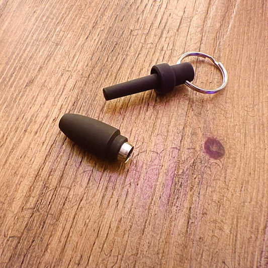 Cigar Piercer on a wooden surface