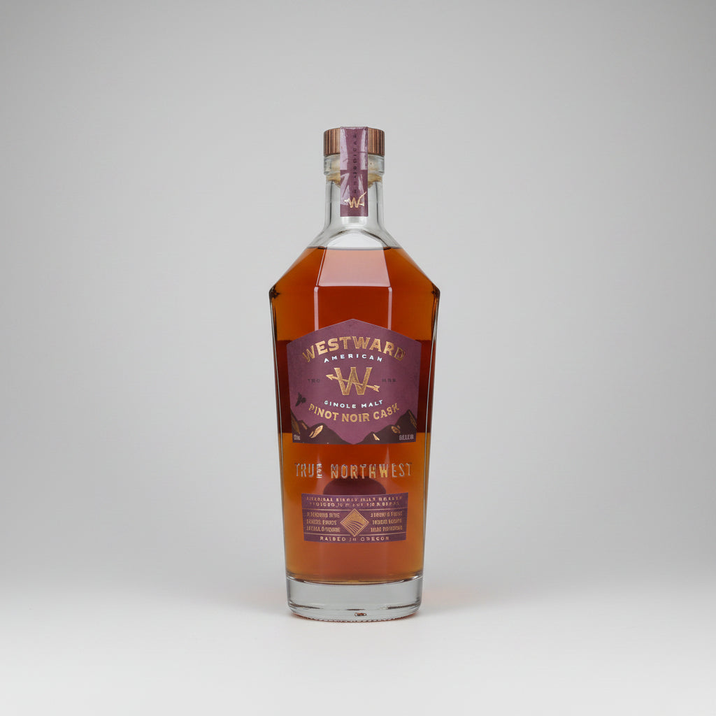 A bottle of Westward American Full Northwest AMERICAN Whisky, showing the amber liquid and maroon label against a white background.