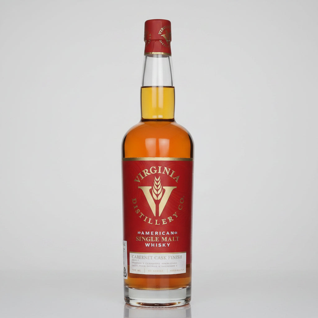 A bottle of Virginia Distillery Co. American Single Malt Whisky, 1950, featuring a red label with gold lettering and a red wax seal on a light gray background.