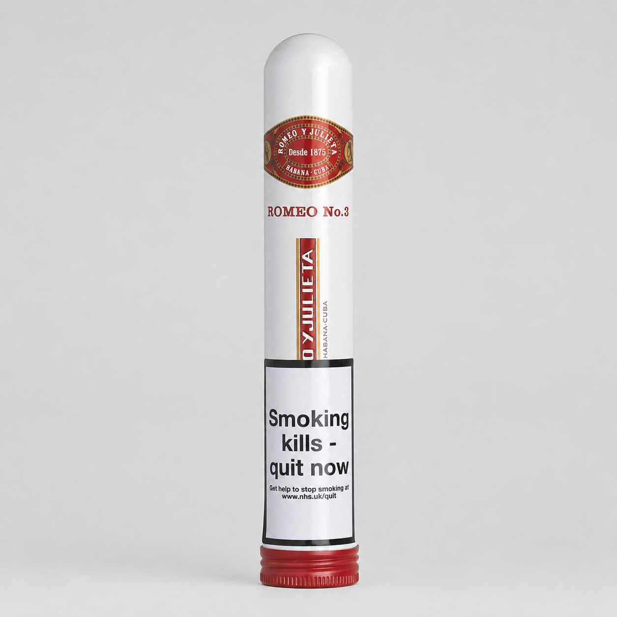 A single cylindrical smoking cessation device standing upright on a light gray background. The device is primarily white with a red cap and a red-and-gold label near the top.