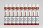 A single cylindrical smoking cessation device standing upright on a light gray background. The device is primarily white with a red cap and a red-and-gold label near the top.