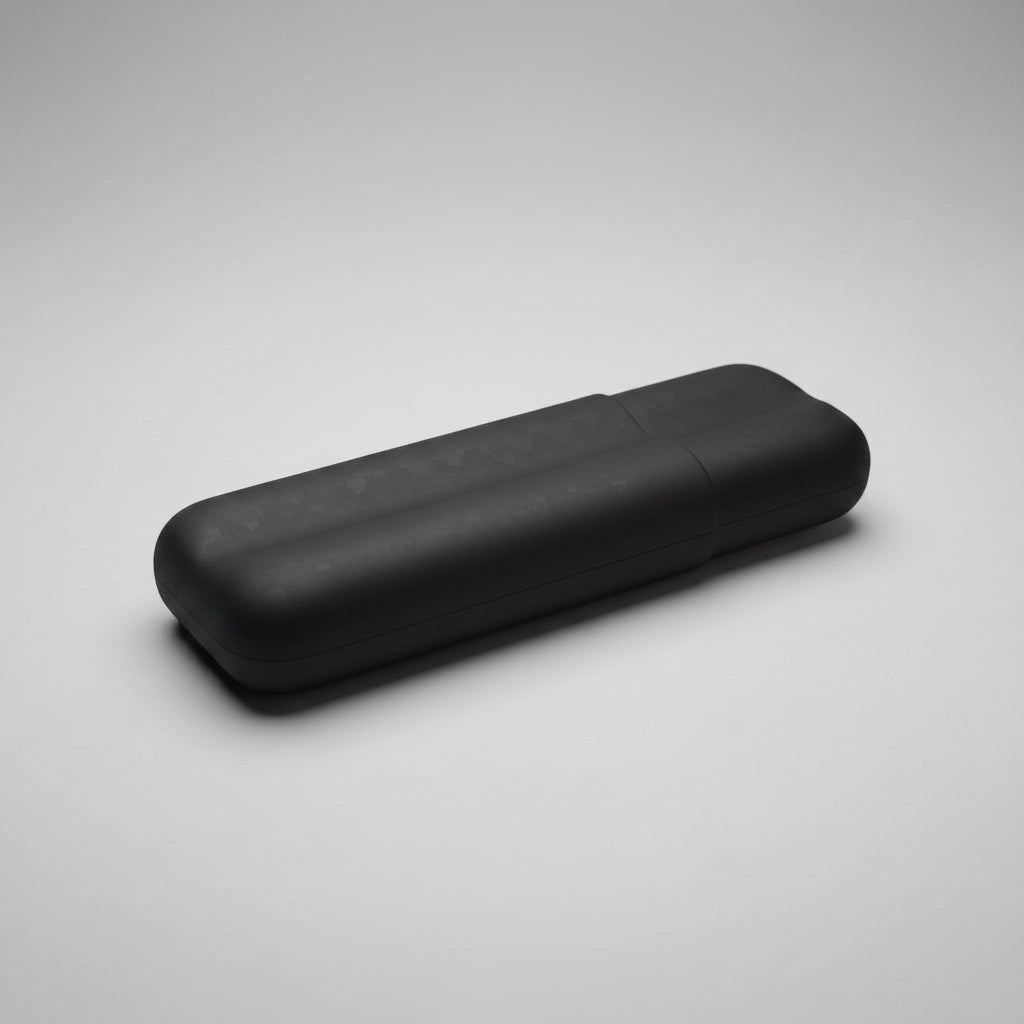 A black carbon fiber case with a matt finish, shown closed on a neutral gray background.