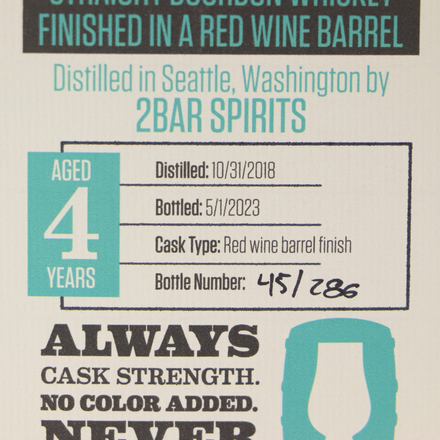Whiskey label with text about distillation details and barrel finish.