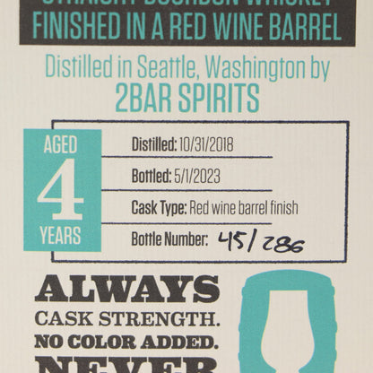 Whiskey label with text about distillation details and barrel finish.