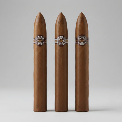 A single brown cigar standing upright on a light gray studio background, featuring a silver and black band with a circular logo near the top.