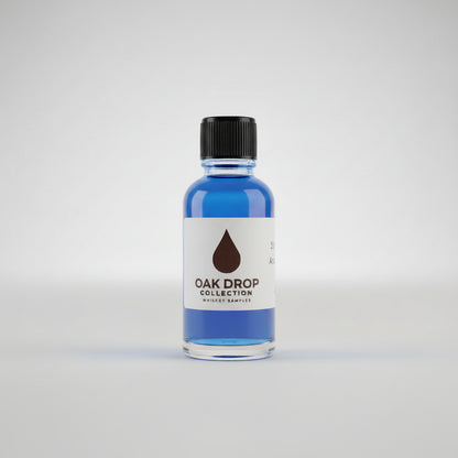 Bottle of Oak Drop Collection whiskey sampler on a bar counter with a blurred bar background