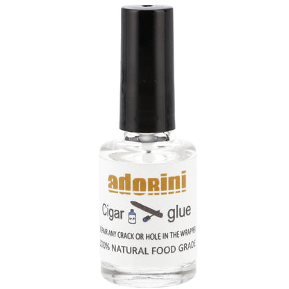 Bottle of Adorini cigar glue on a white background