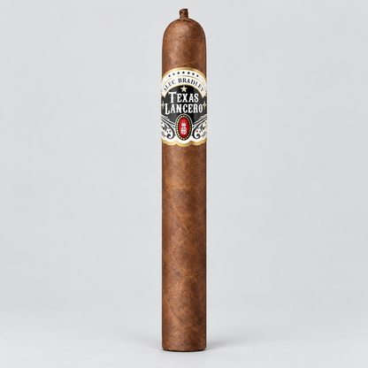 A single brown cigar standing upright on a light gray background, featuring a white, black, and gold label that reads 'C. Bragado' and 'Texas Lancero'.