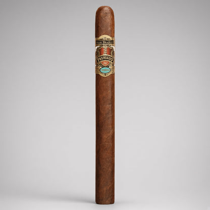 A single premium cigar standing upright against a neutral light gray background. The cigar has a rich medium-brown wrapper with a detailed silver, gold, and turquoise band from the brand Los Altos.