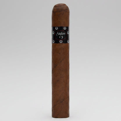 Cigar with a black band labeled 'Asylum 13' on a white background