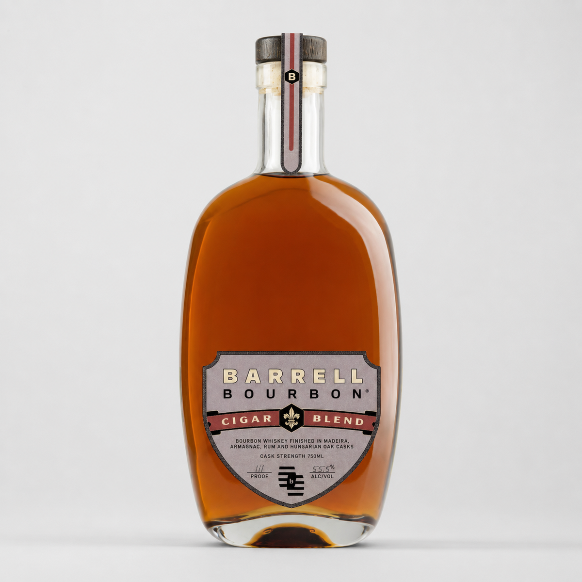 A bottle of Barrel Bourbon Cigar Blend bourbon whiskey, featuring a clear glass bottle with amber-brown liquid, a detailed silver and red label, and a black and silver cap, set against a plain light gray background.