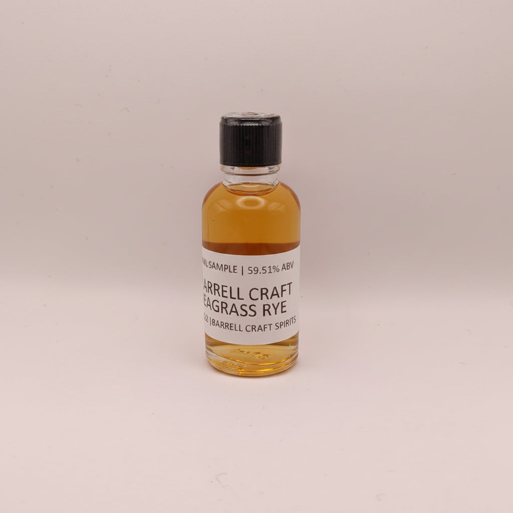 Small bottle of Barrell Craft Seagrass Rye on a light gray background