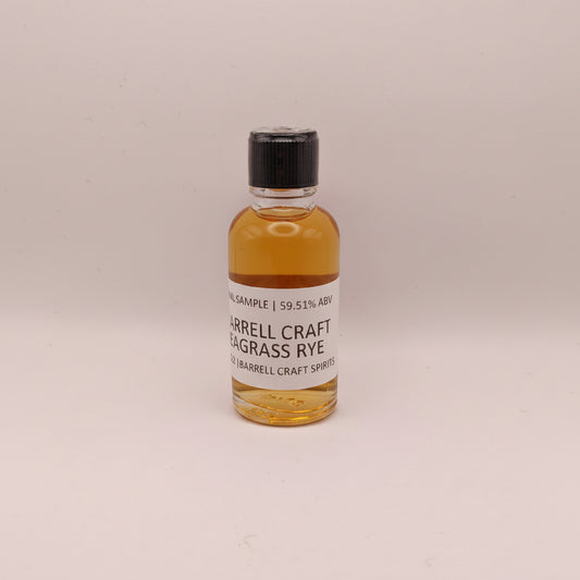 Small bottle of Barrell Craft Seagrass Rye on a light gray background