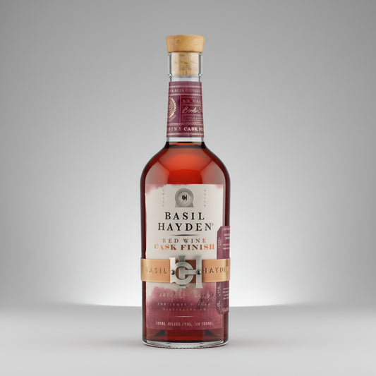 Bottle of Basil Hayden whiskey on a white background