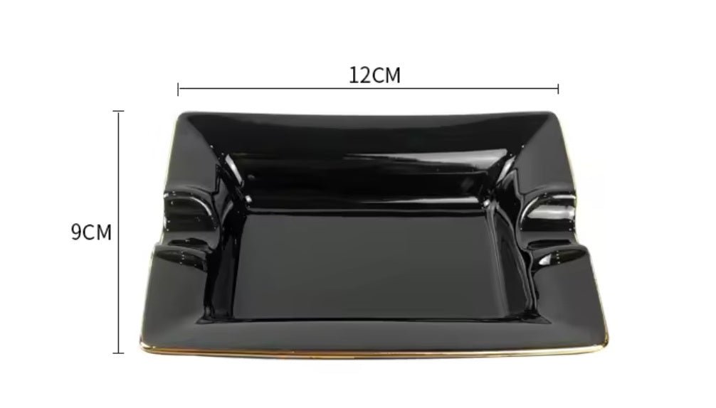 Black ceramic ashtray with dimensions labeled on a white background