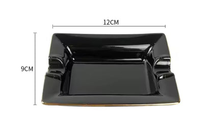Black ceramic ashtray with dimensions labeled on a white background