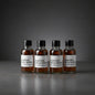 Four bottles of Blanton's Single Barrel whiskey on a white background