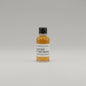 Small bottle of Blantons Whiskey on a beige background