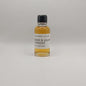 Small bottle of Bond & Lillie Straight whiskey sample on a gray background