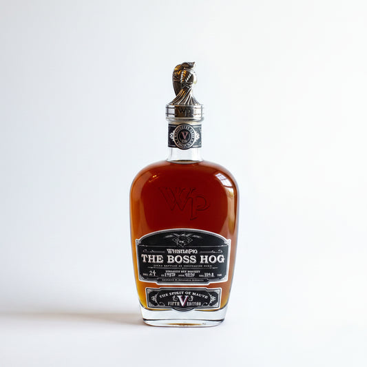 Bottle of 'The Boss Hog' whiskey with packaging on a white background