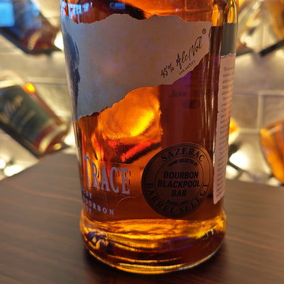 Bottle of Sazerac  BARREL SELECT BUFFALO TRACE bourbon on a bar counter with blurred background