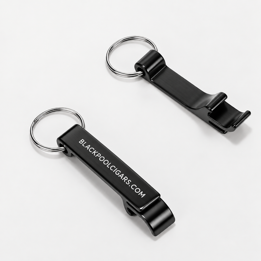 Two black metal keychain bottle openers with silver split rings, one showing the white printed text 'BLACKPOOL.CIGARS.