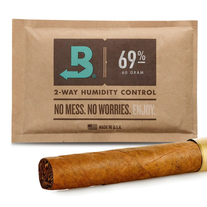 Humidity control pack for cigars with a brown wrapper on a white background