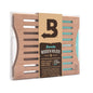 Boveda wooden holder packaging with brand label on a white background
