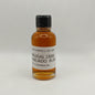 Small bottle of Brugal 1888 Anejo Rum on a white background