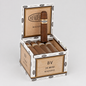 A box of Buena Ventura cigars, with the lid open to display a single upright Maduro cigar and several cigars inside. The packaging features a light wood-grain panel and white sides with black text.