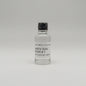 Clear bottle of buffalo trace white dog mash #1 with black label on a white background