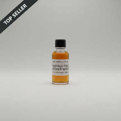 Small bottle of Buffalo Trace Kosher Whey on a light gray surface