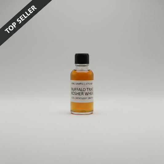 Small bottle of Buffalo Trace Kosher Whey on a light gray surface