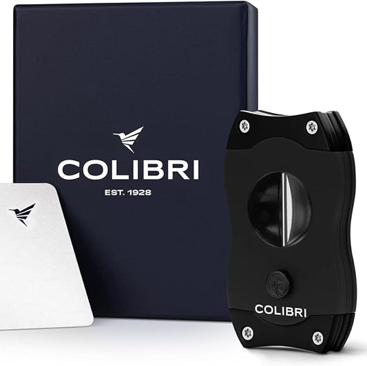 Colibri cigar cutter and card with warranty information on a white background