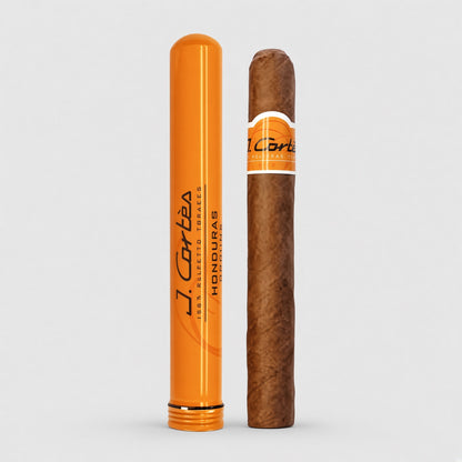 A J. Cartés cigar and its matching orange cylindrical packaging container, displayed side-by-side on a light gray background.