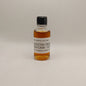 Small bottle of Catoctin Creek Rum cask whiskey with a label on a light gray background