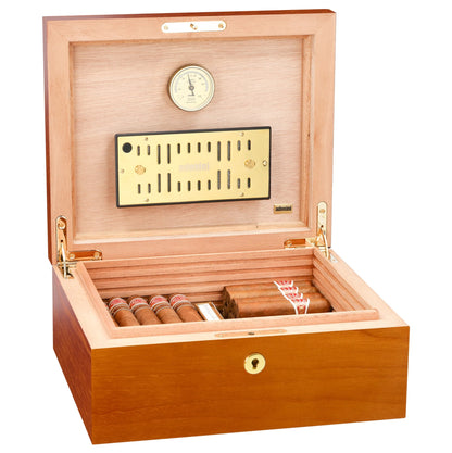 Wooden humidor with a humidity gauge on a white background