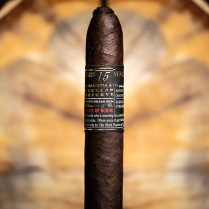 Cigar with label against a blurred natural background