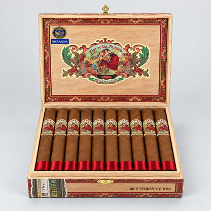 An open cigar box containing 20 cigars, photographed on a light gray studio background. The box lid features a large colorful illustration with the text 'Sabor de las Antillas' and a visible Nicaragua label.
