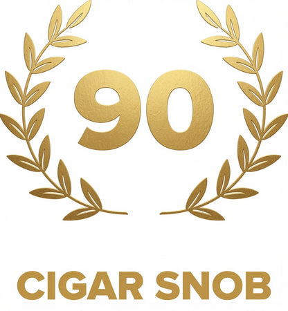 A gold graphic featuring the number 90 centered within a laurel wreath, with the text 'CIGAR SNOB' below in gold on a white background.