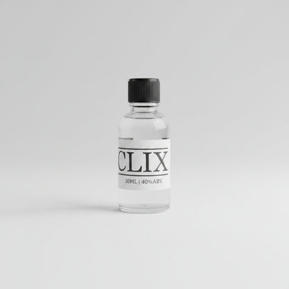 Small bottle labeled 'CLIX' on a bar counter with a blurred background