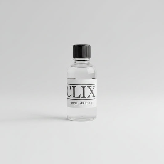 Small bottle labeled 'CLIX' on a bar counter with a blurred background