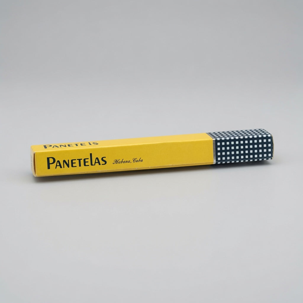 A yellow Panetelas cigar case with a navy blue and white checkered patterned end cap, shown on a neutral gray background.