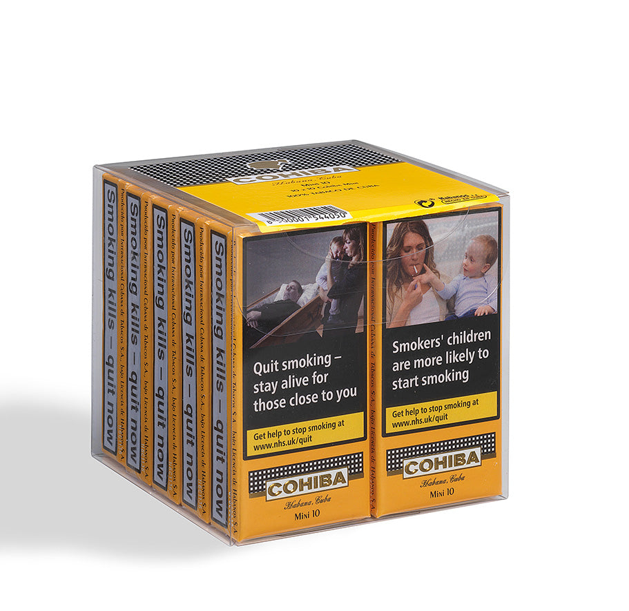 A clear plastic display box containing multiple COHIBA Quit Smoking cards, shown on a white background. The packaging features yellow borders and a prominent health warning panel with a photo of a mother and child.