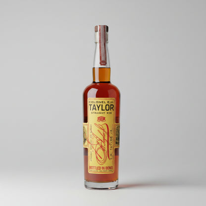 Bottle of Colonel E.H. Taylor Straight Rye whiskey on white studio background