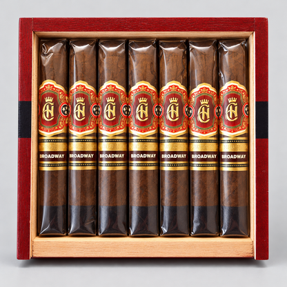 Eight cigars in clear plastic sleeves with red, gold, and black labels reading 'BROADWAY' and a large 'BA' logo, arranged inside an open reddish-brown wooden presentation box on a light gray background.
