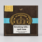 A square dark brown wooden cigar box with gold and light blue printed graphics, featuring the brand name 'La Imperiosa' and a prominent white smoking-health warning label on the front.